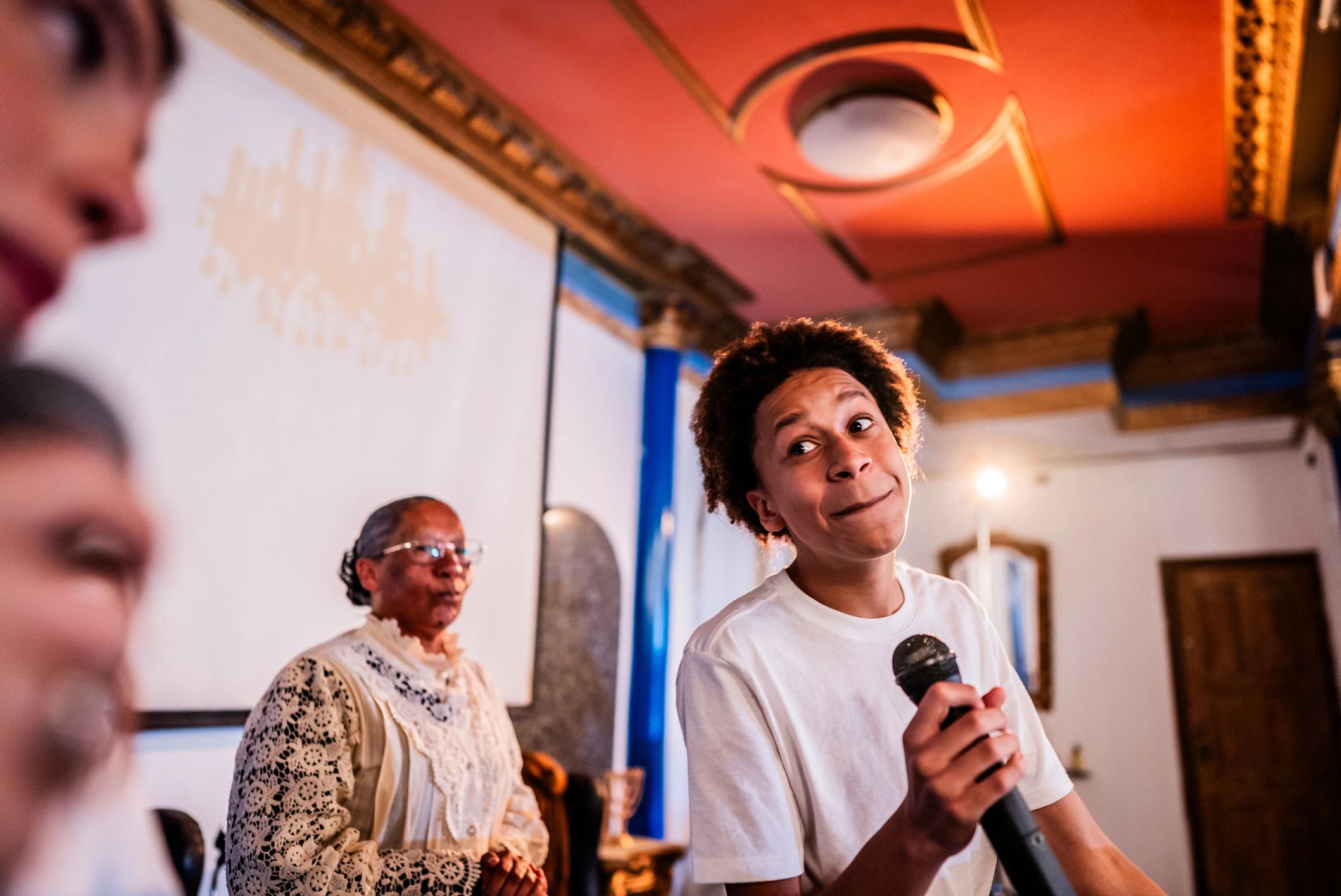 Young singer performing in a community setting